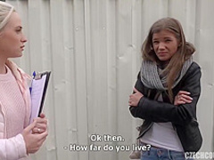 Two kinky girls are kneeling on the floor and sharing their friend’s huge, fat cock