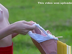 Tiny titted ebony and ivory teens stripping outdoor