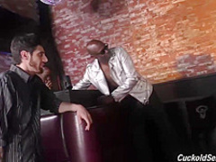 Bella Jane is kneeling in front of many horny guys and sucking their dicks, like a pro