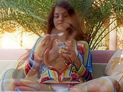 Young brunette loves to masturbate and eat