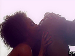 Ebony chick with curly hair is having group sex with friends and enjoying it a lot