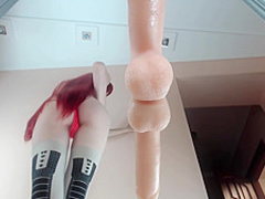 Teen with red hair dressed in stockings
