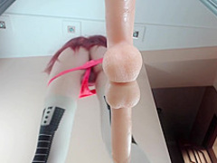 Teen with red hair dressed in stockings
