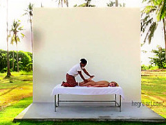 Young blonde goes for tropical touch massage