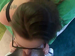 Dani is wearing black glasses and erotic stockings while sucking and riding her friends hard dick