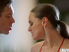 Smashing brunette is sucking two dicks in her bedroom and enjoying every single second of it