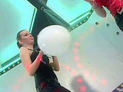 Smashing women are making love in front of other people and enjoying every second of it