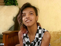 Innocent ebony teen Yvette is taking her dress off and showing her hairy pussy and ass