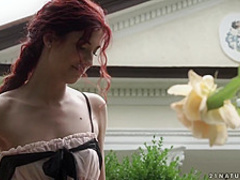 This redhead enjoys outdoor sex today