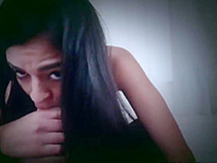 Dark haired babe, Vienna Black loves to suck a massive cock in front of the camera