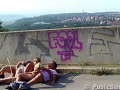 Incredible blonde woman is having a threesome in a public place, with two horny strangers