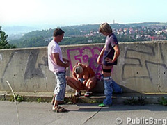 Incredible blonde woman is having a threesome in a public place, with two horny strangers