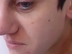 Small titted woman is kneeling on the floor and sucking two dicks, like a real pro