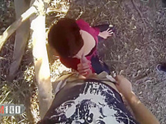 Short haired woman is about to suck dick in the nature, before riding it like crazy