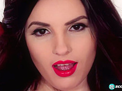 Brunette with big, saggy tits, Talia is posing topless in front of the camera, for cash