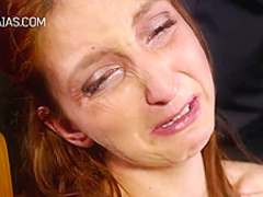 Slim lady is into BDSM and likes to get whipped very hard, while tied up tight