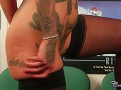 Tattooed blonde, Alice Judge sucks dick and gets cum on face, during a porn video casting