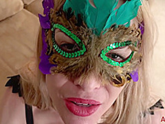 Masked blonde woman, Ciel is wearing black stockings and playing with her new, purple dildo