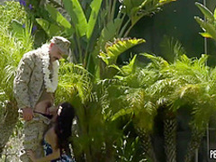 Exotic babe with a flower in her hair, Avery Black is about to fuck a horny soldier