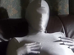 The Young Japanese Girl Masturbated in a Silver-gray Zentai.