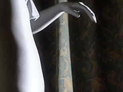 The Young Japanese Girl Masturbated in a Silver-gray Zentai.