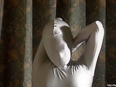 The Young Japanese Girl Masturbated in a Silver-gray Zentai.