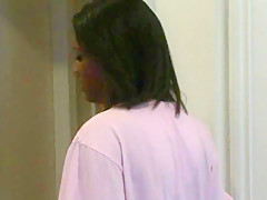 A Black Kitten with a Mature Woman.